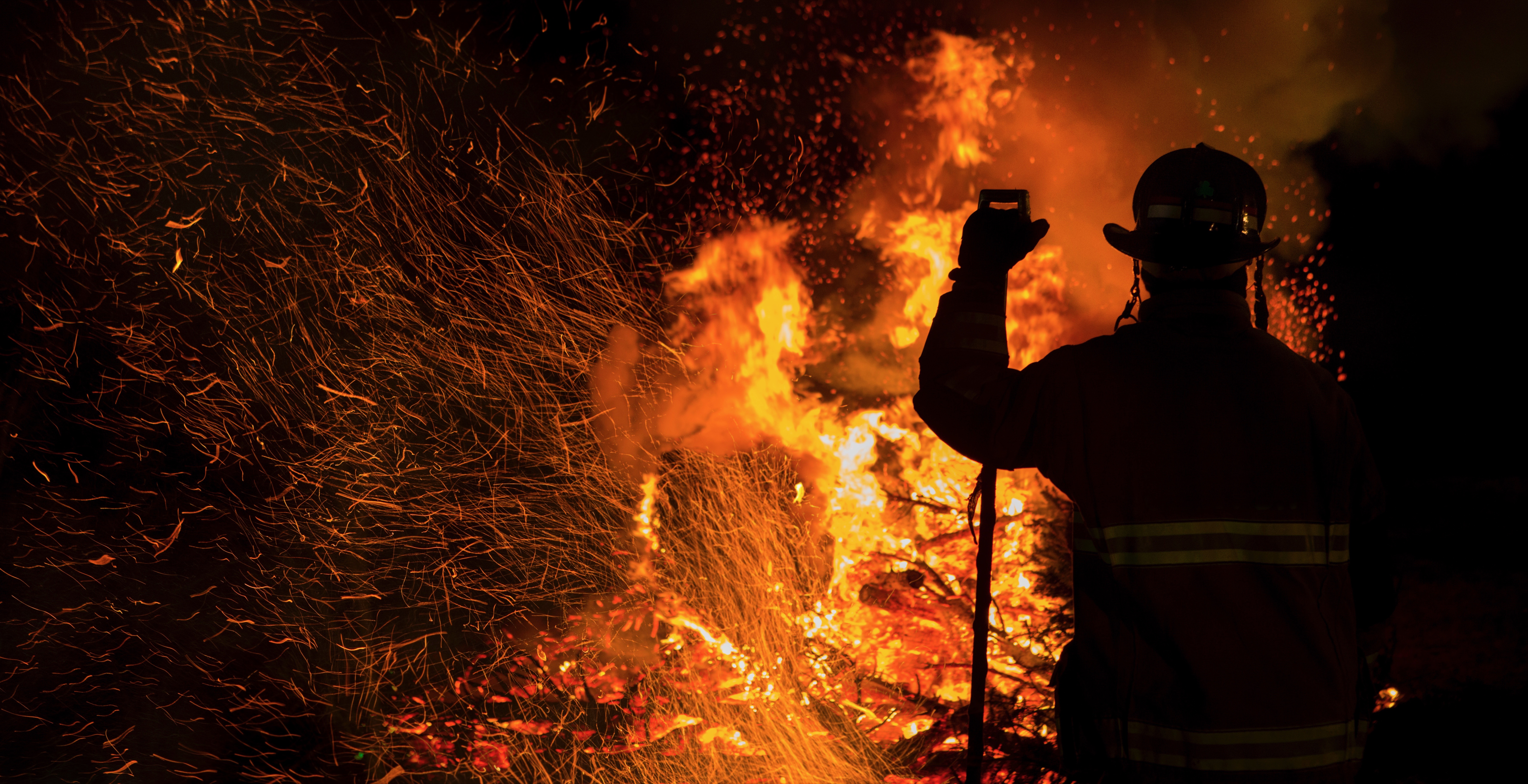 Particles of a non-toxic flame suppressor, originally designed for use on the launchpad, can now be licensed for firefighting purposes. Credit: Peterfactors via Getty Images