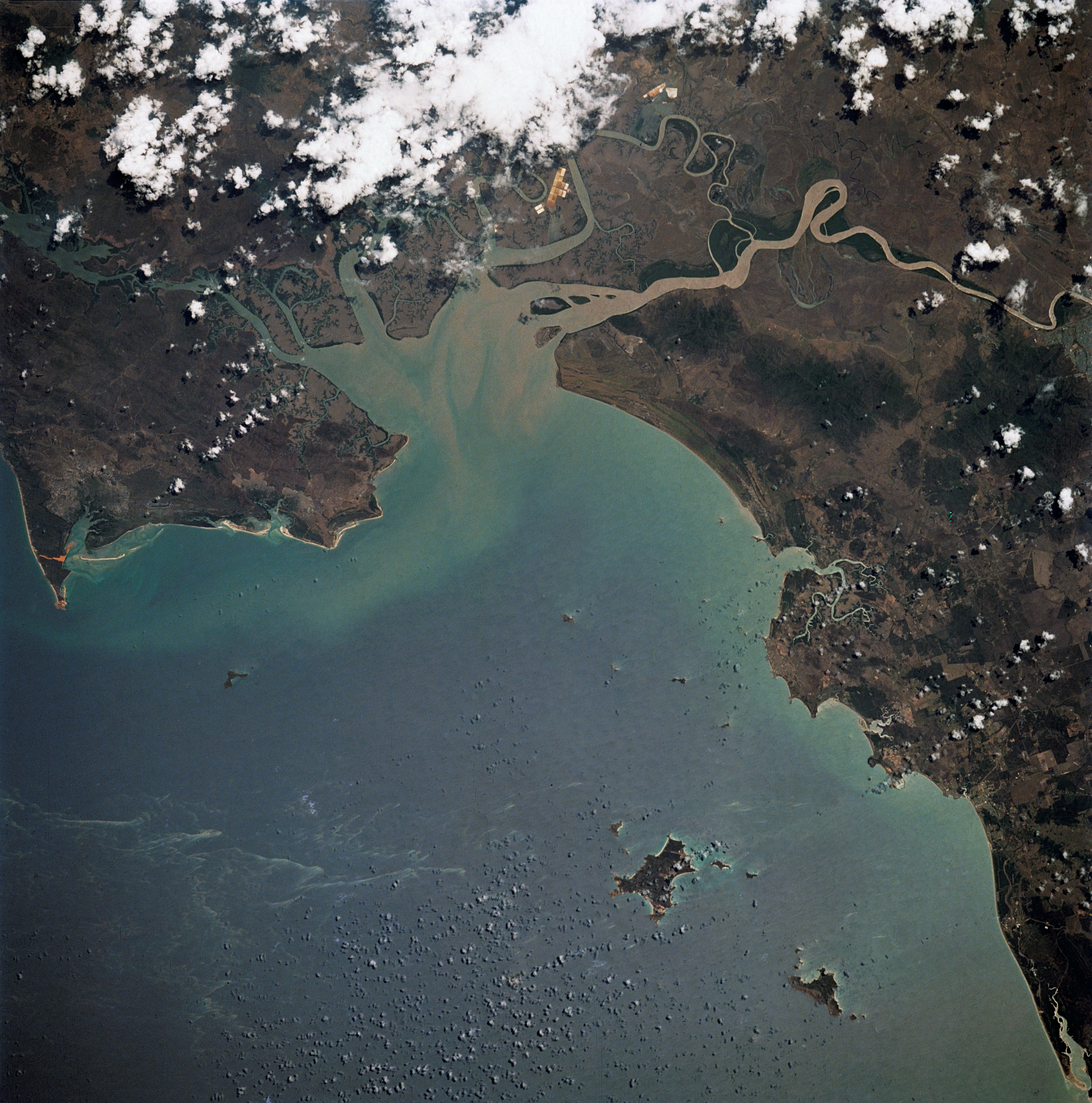 Algal blooms in the ocean, like those seen in this satellite image off the shore of Australia, can have harmful environmental effects -- but the plant itself can be harnessed for good. NASA has built a technology that uses the tiny green plants to clean wastewater and generate biofuel, and it’s available for companies to license. Credit: NASA