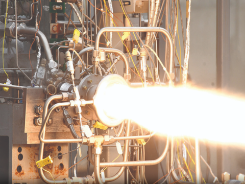 A rocket engine firing during ground test at NASA Marshall Space Flight Center.