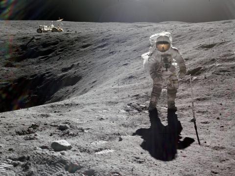 Astronaut Charles Duke photographed collecting lunar samples at Station 1 NASA ID: as16-114-18423