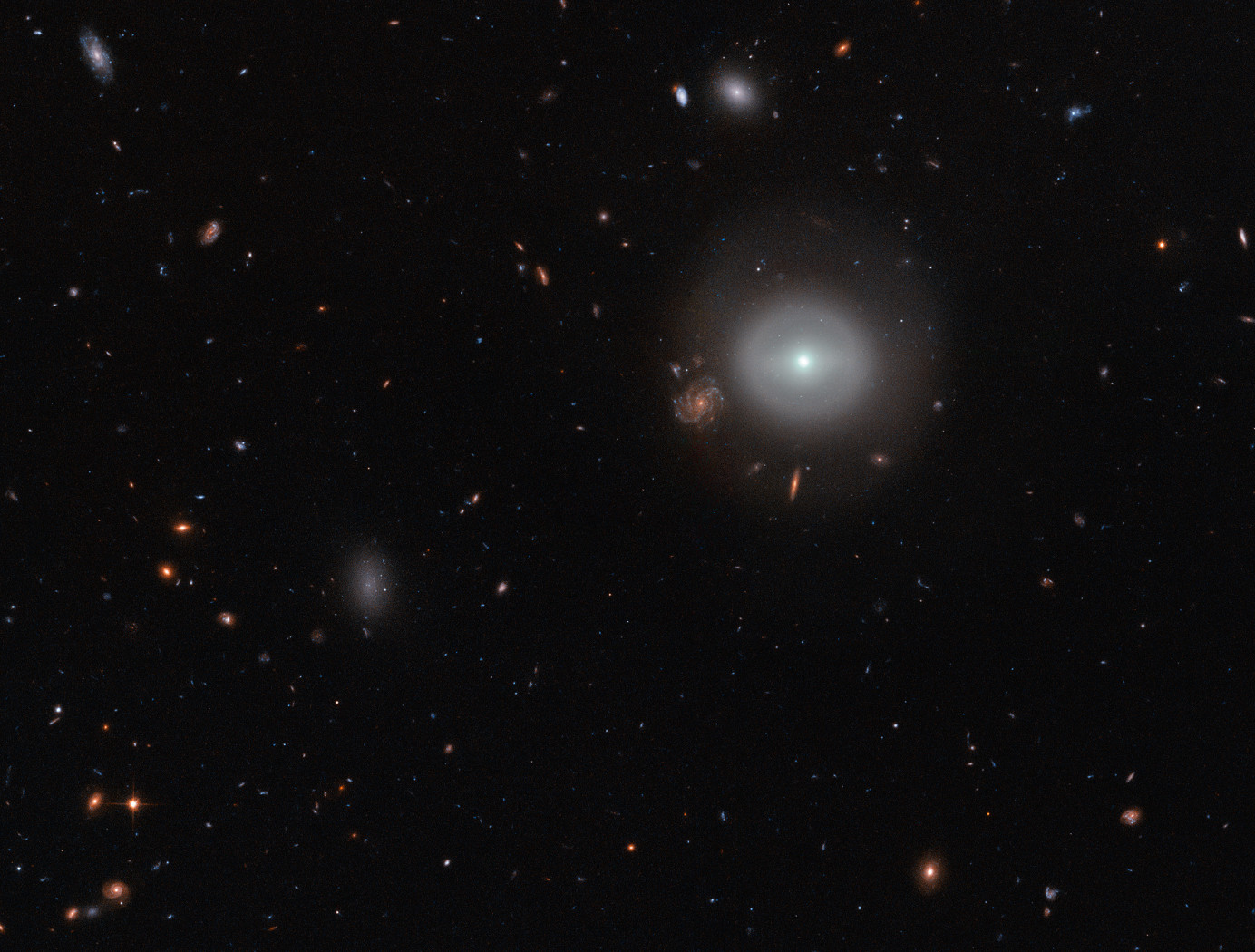 Hubble Finds a Lenticular Galaxy Standing Out in the Crowd
Credit: NASA/ESA/Hubble; acknowledgements: Judy Schmidt (Geckzilla)