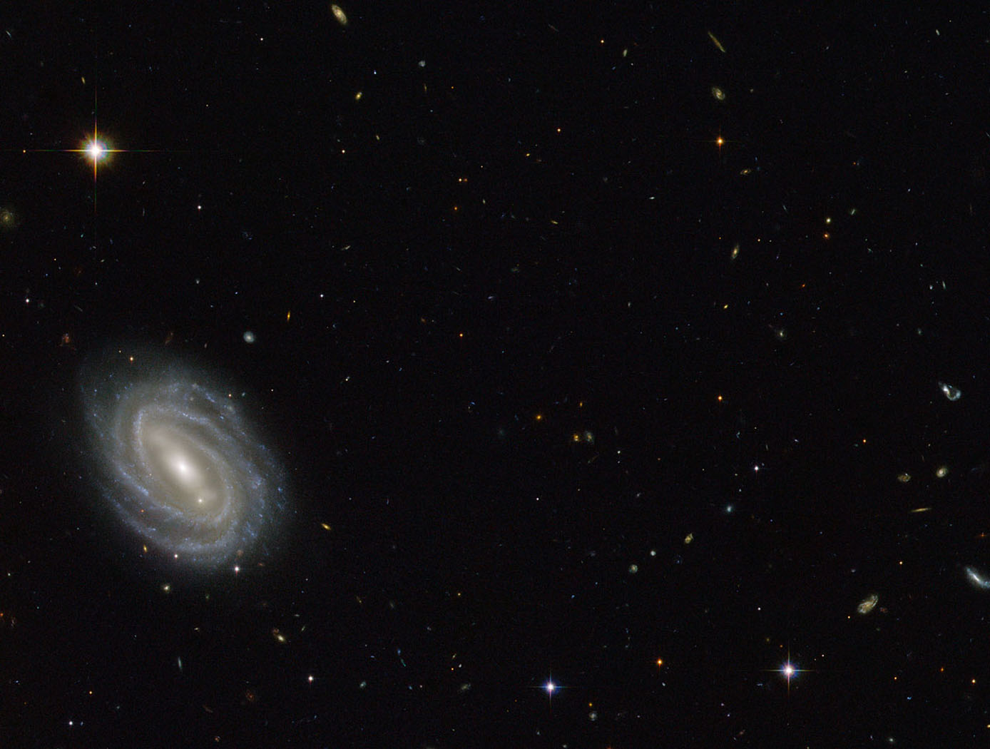 Hubble Sees Spiral in Serpens; Credit: ESA/Hubble & NASA,