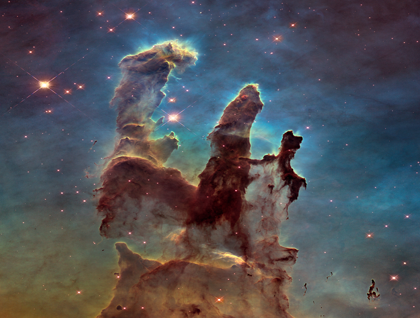 NASA's Hubble Space Telescope has revisited the famous Pillars of Creation, revealing a sharper and wider view of the structures in this visible-light image.