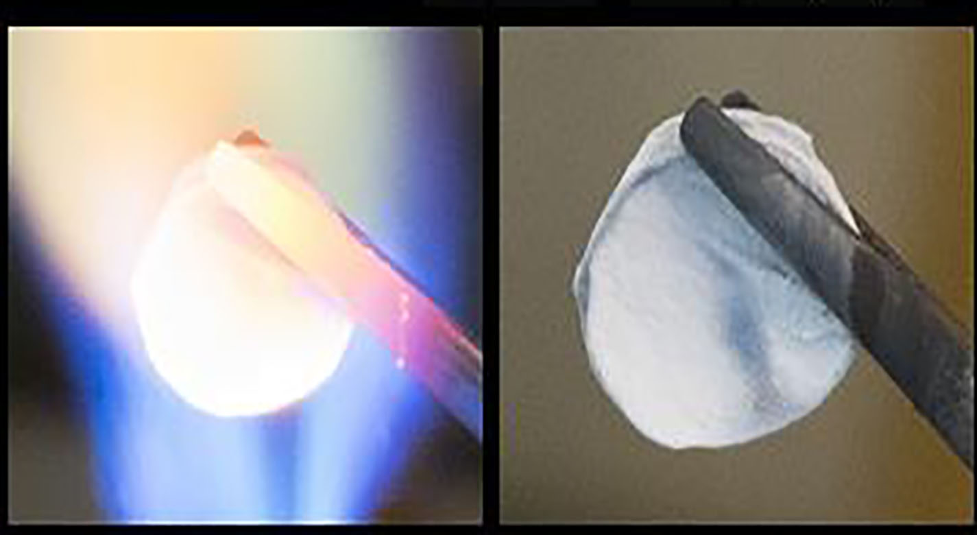 Sample of BNNT mat under torch, shown unscathed after test - Image Credit: NASA