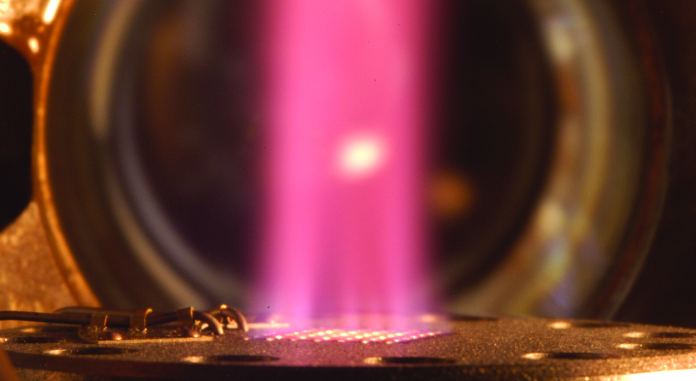 The NASA Glenn burner operating at 10 atm inside an optically-accessible high pressure burner facility with premixed stoichiometric hydrogen-air reactants