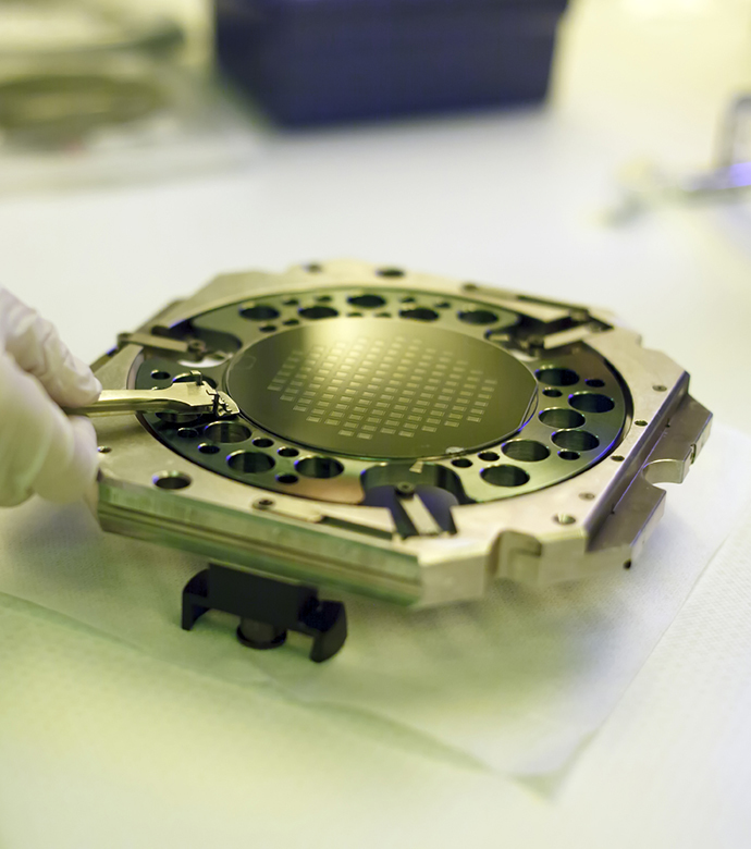 Glenn's Hall effect thruster technology has direct implications for semiconductor manufacturing processes, such as ion etching (pictured above). 