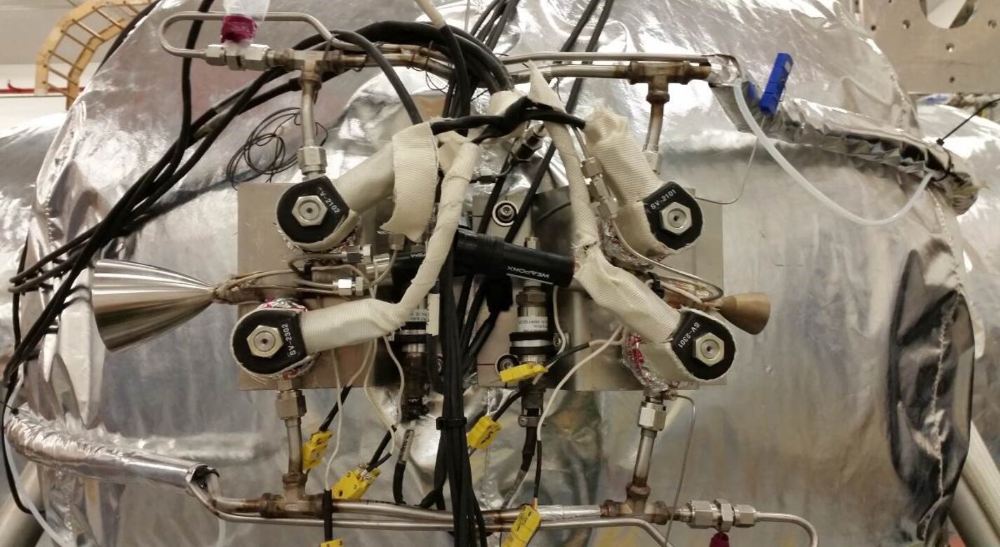 ICPTA reaction control system pod with one 28 lbf-vac engine (left) and one 7 lbf-vac engine (right) installed with coil-on-plug spark igniter.
